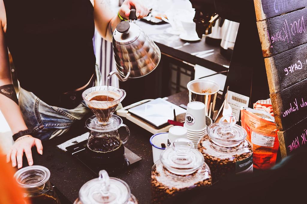 Various professional coffee brewing equipment on wooden table