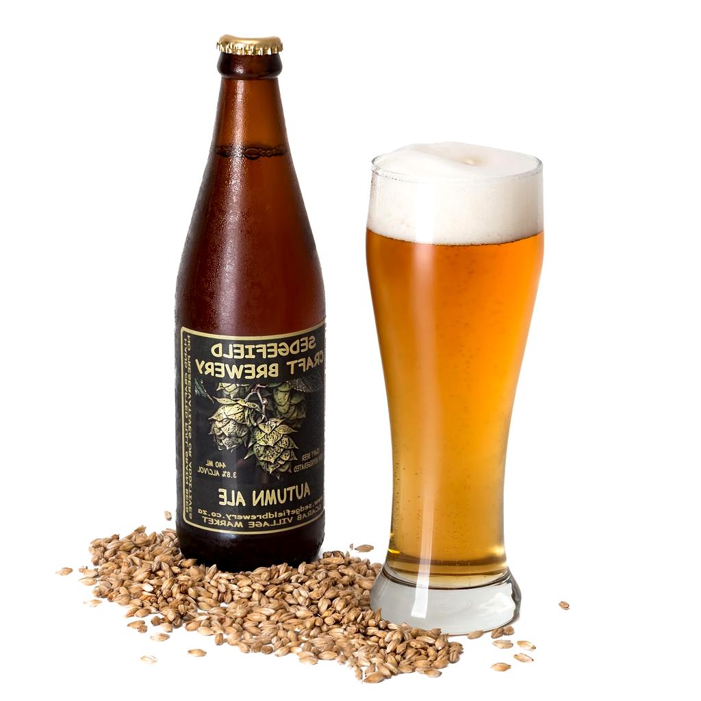 Cold brew coffee steeping in glass jar with coffee grounds immersed